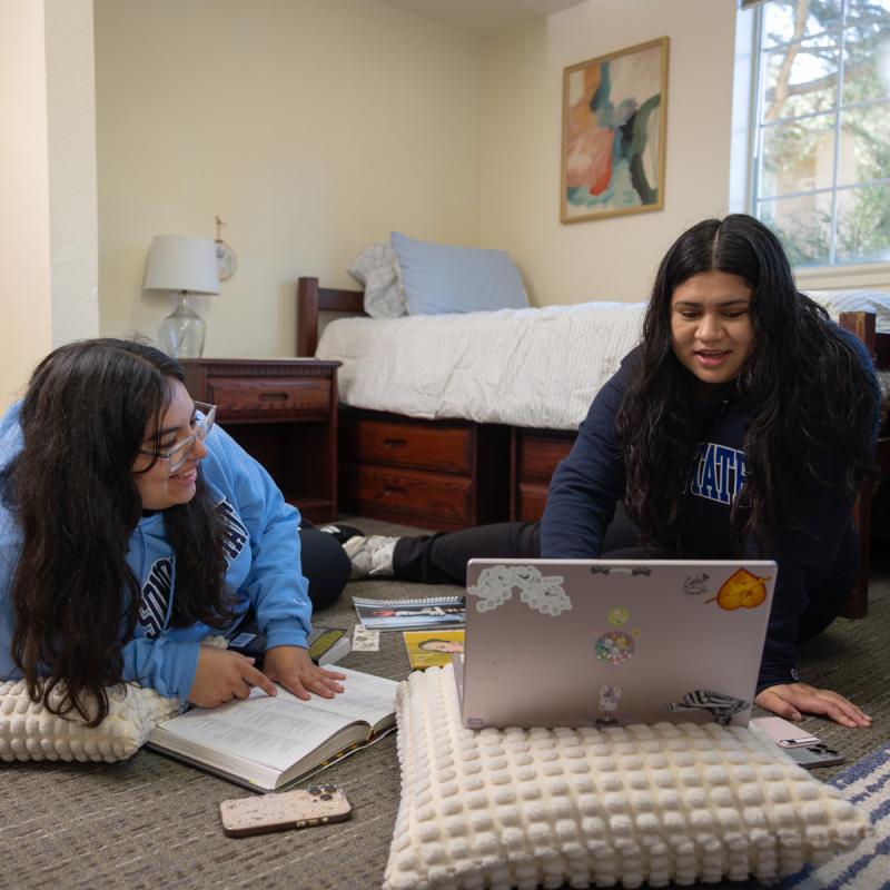 students studying on floor