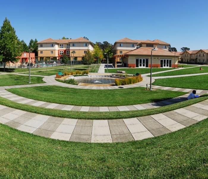 Beaujolais Village buildings in background and lawn area