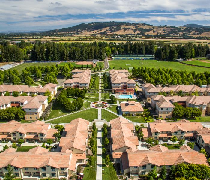 Aerial photo of campus housing of Beujolais and Tuscany and the Sonoma hills 
