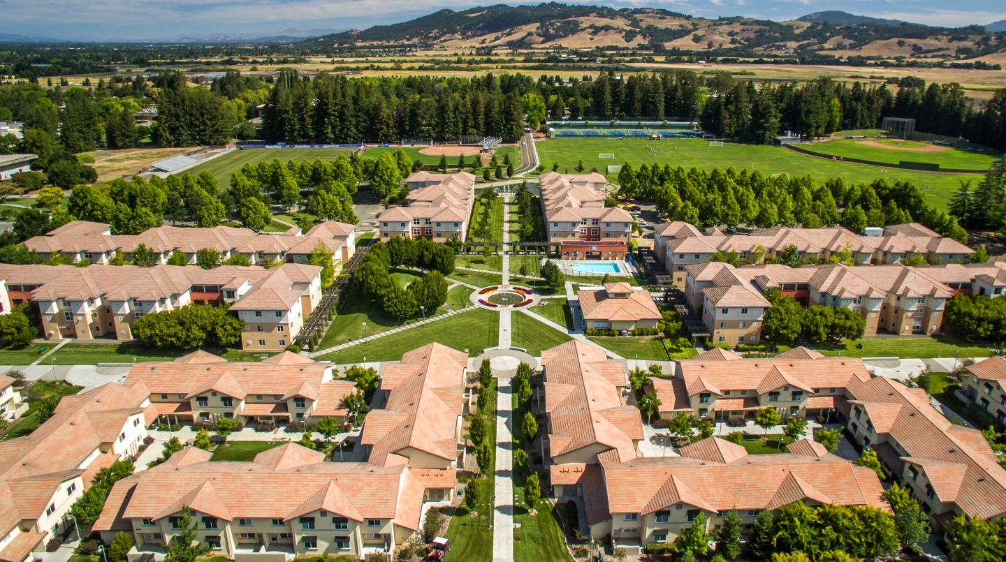 Aerial photo of campus housing of Beujolais and Tuscany and the Sonoma hills 