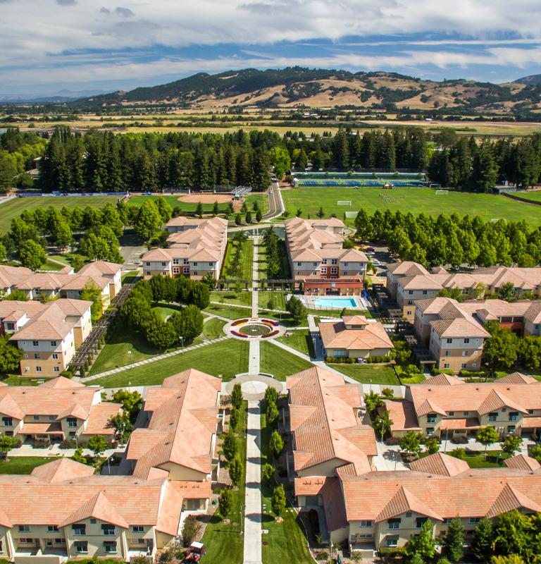 Aerial photo of campus housing of Beujolais and Tuscany and the Sonoma hills 