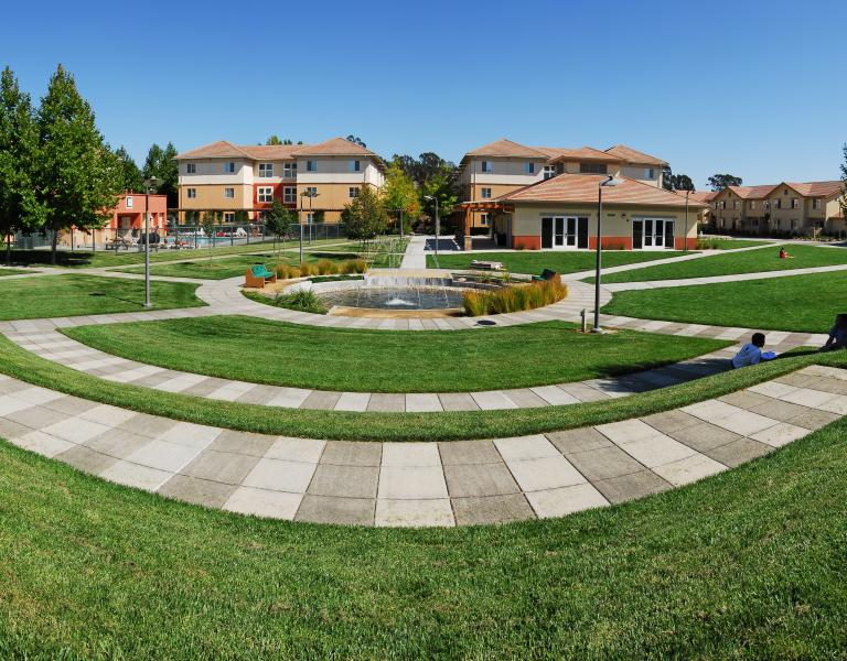Beaujolais Village buildings in background and lawn area