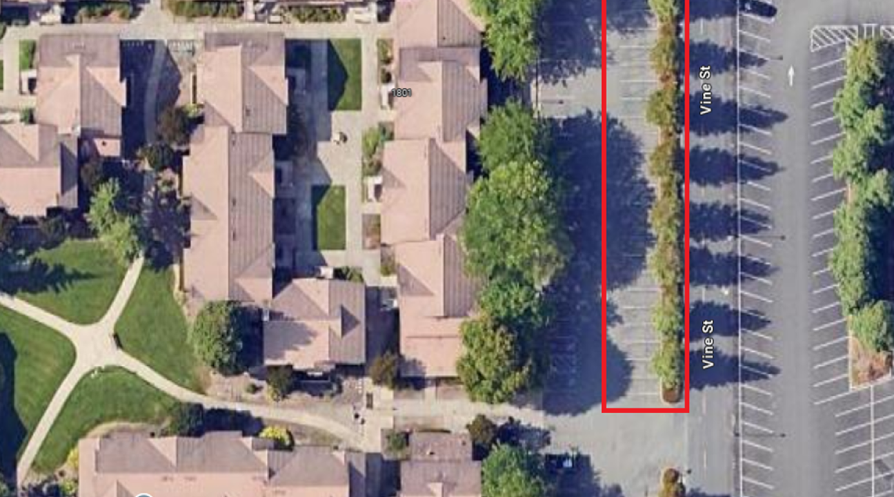 Northeast corner nearest Vine St. and Redwood Circle - Parking lot between Sauvignon Village - Burgundy and Colombard buildings and J Parking Lot.  
