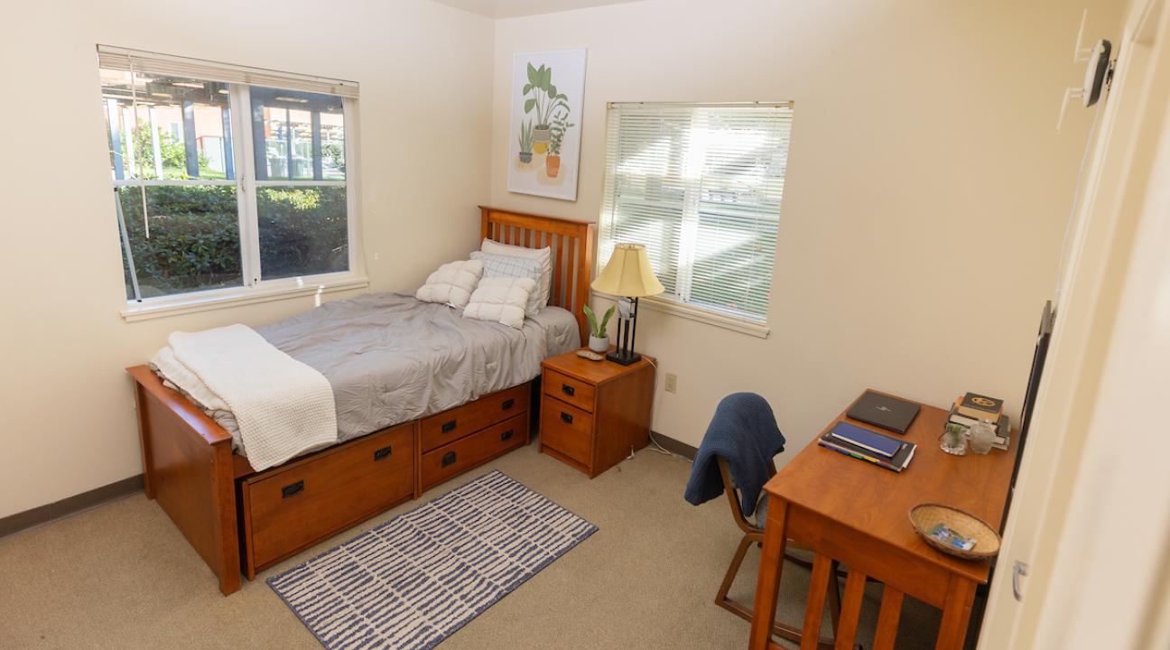 Beujolais dorm room with bed, desk and chair