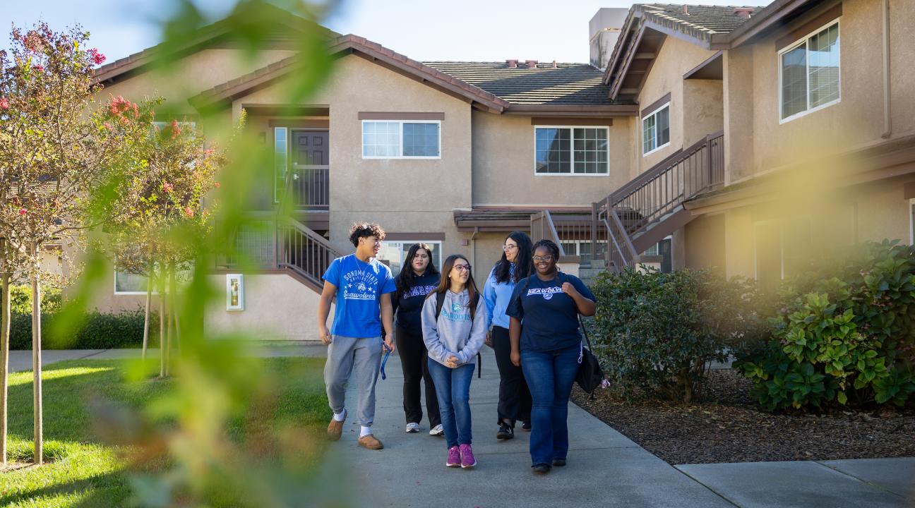 Group of students walking outside in Sauvignon Village