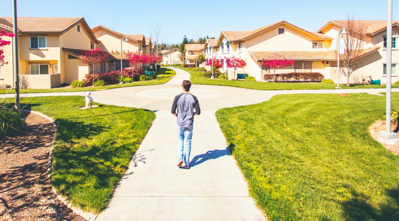 student walking through tuscany