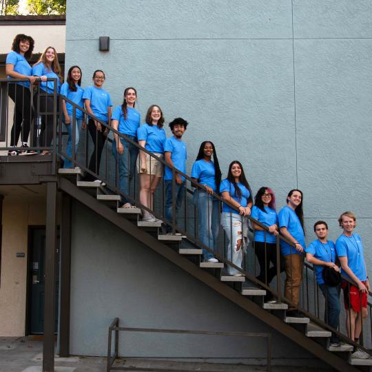 RA student staff standing on a staircase