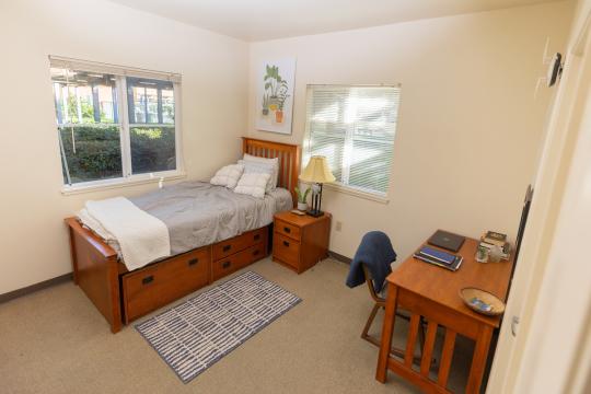 Beujolais dorm room with bed, desk and chair