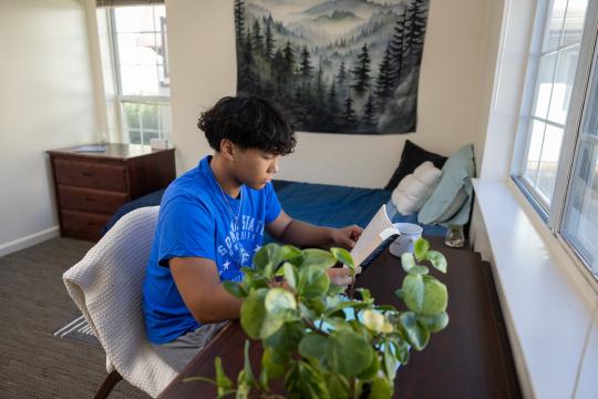 Student sitting at a desk studying