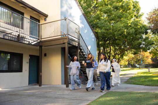 Students walking outside Verdot Village