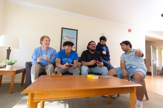 roommates around the tv together 